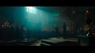people standing in church with large windows — John Wick: Chapter 4