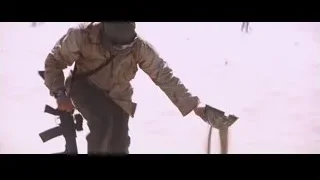 man in desert holding up helmet — Iron Man