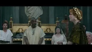 man in white robe in ornate room — Gladiator 2