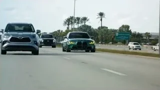 green sports car driving on highway — Sports Cars