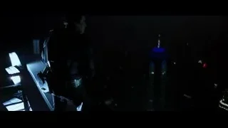 person in suit and helmet on rooftop — Batman: The Dark Knight