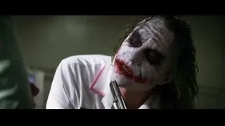 Joker's face with blood and gun — Batman: The Dark Knight