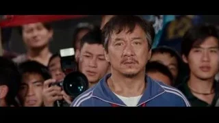 man speaking at press conference — The Karate Kid