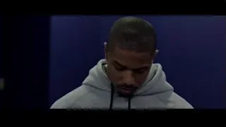 young man in hoodie deep in thought — Creed
