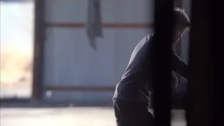 Man with bloody face by window — Breaking Bad