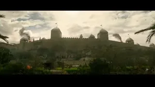 Stone castle with fire and smoke — Gladiator 2