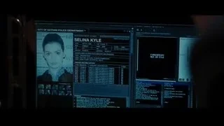 Selina Kyle police ID card on computer screen — Batman: The Dark Knight Rises