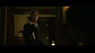 Young man deep in thought in bedroom — The Social Network
