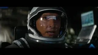 man in white helmet in space station — Interstellar