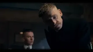 man in suit holding whiskey at bar — Peaky Blinders