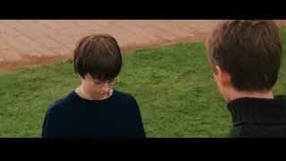 Two boys with football on grassy path — Harry Potter and the Philosophers Stone