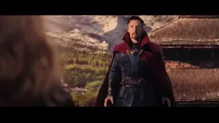 Man in red cape in mountain landscape — Doctor Strange 2