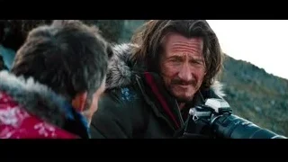 man with camera on rocky landscape — The Secret Life of Walter Mitty