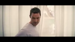 Man in t-shirt standing by window — Interstellar