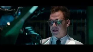Man in suit speaking into microphone — The Amazing Spider Man 2
