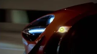red sports car in motion at night — Sports Cars