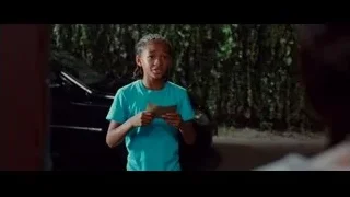 Young girl standing in front of car — The Karate Kid