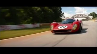 red sports car driving on race track — Ford v Ferrari