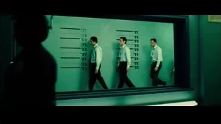 six men standing in front of window — Limitless