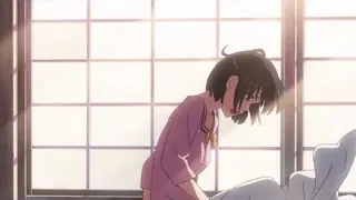 young woman sitting by window sadly — Your Name