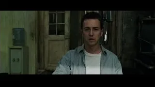 Young man sitting in dimly lit room — Fight Club