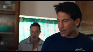 Man in kitchen looking at tablet — The Bear