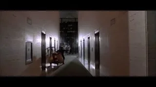 person lying unconscious in corridor — American Psycho