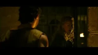 man and woman in dimly lit stone room — Gladiator 2