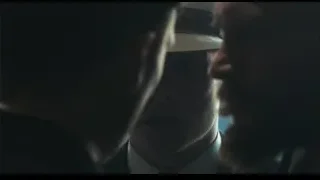 three men in suits having tense conversation — Peaky Blinders