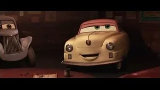 animated cars in a dimly lit room — Cars 3