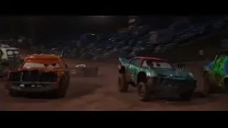 Car racing on dirt track at night — Cars 3
