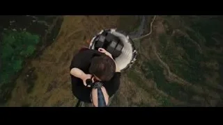 person bungee jumping from airplane — Batman: The Dark Knight Rises