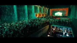 crowd dancing in nightclub with stage — John Wick: Chapter 4