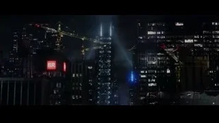 night cityscape with lit buildings and cranes — The Amazing Spider Man
