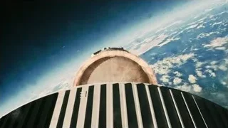 View of Earth with satellite dish — Interstellar