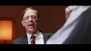 two men speaking in office — Jobs