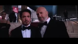 two men in tuxedos on staircase — Iron Man
