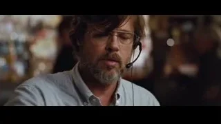 man with headset and glasses in office — The Big Short