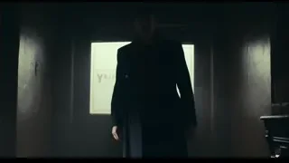 man in suit and hat in dimly lit room — Peaky Blinders