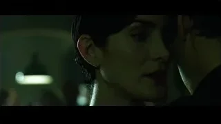 man resting head on woman's shoulder — The Matrix