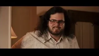 man with long hair holding white door — Jobs