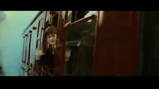Harry Potter looking out red train window — Harry Potter and the Philosophers Stone