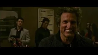 man with curly hair surprised hands raised — Now You See Me 2