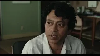 middle-aged man looking at camera in room — Life of Pi