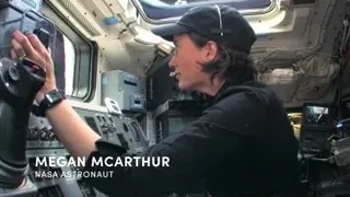 NASA astronaut working in space station cockpit — Elon Musk: Return to Space