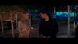 Young couple on rooftop at night — The Amazing Spider Man 2