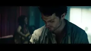 Man with beard in dimly lit room with window — Superman: Man of Steel