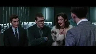 people conversing in futuristic hallway — Now You See Me 2