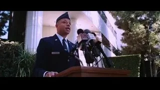 military man speaking at podium — Iron Man