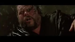 distressed man with wet bloody face — Batman